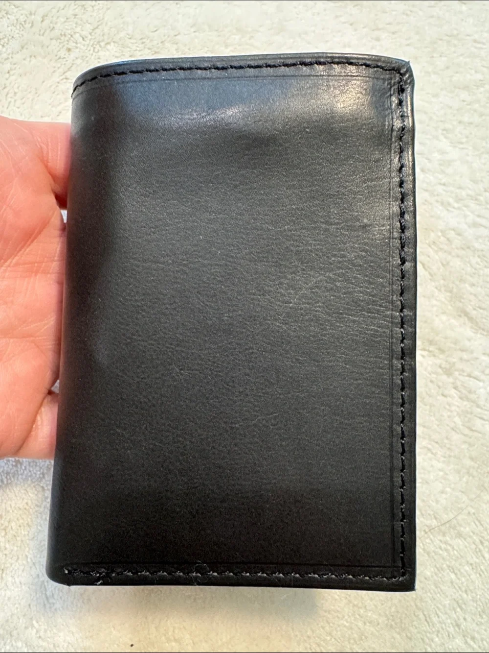 NWOT Lord & Taylor black leather tri-fold wallet.